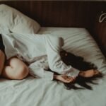 sad woman on her bed